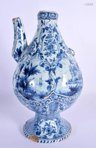 A 19TH CENTURY DELFT BLUE AND WHITE TIN GLAZED EWER painted ...