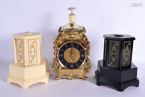 THREE NOVELTY VINTAGE MUSIC BOXES one formed as a decanter. ...