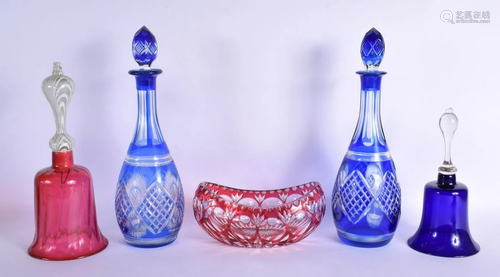 A PAIR OF BOHEMIAN BLUE FLASH DECANTERS with stoppers togeth...