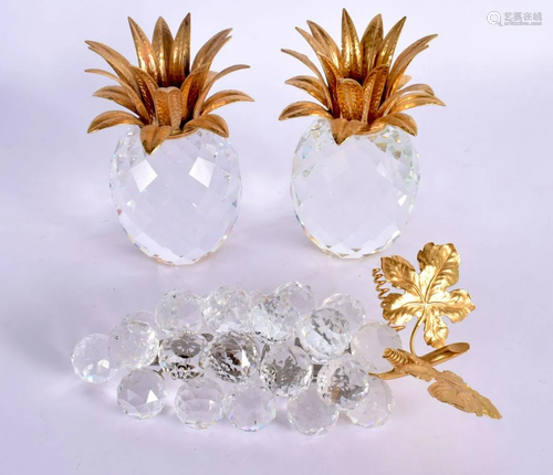 A PAIR OF SWAROVSKI CRYSTAL GLASS PINEAPPLES CANDLE HOLDERS ...