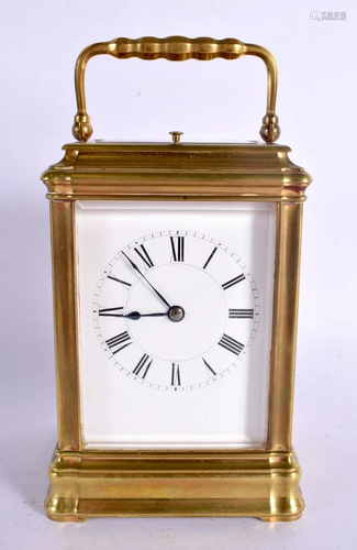 AN ANTIQUE FRENCH REPEATING BRASS CARRIAGE CLOCK. 17 cm high...