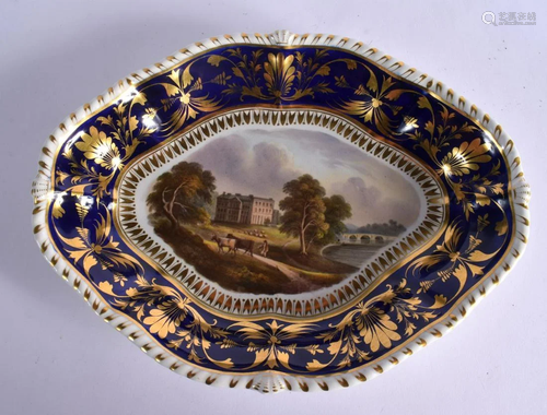 EARLY 19TH CENTURY DERBY DISH PAINTED WITH A VIEW OF ‘BROCKE...