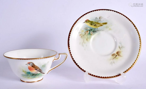 ROYAL WORCESTER TEACUP AND SAUCER EACH PAINTED WITH A LINNET...