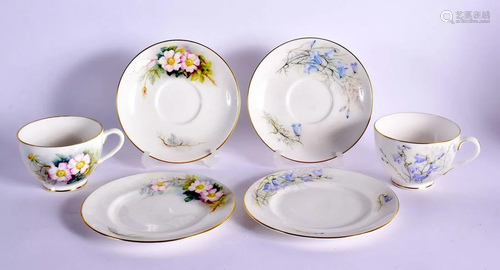 ROYAL WORCESTER TWO FLORAL TEACUP SAUCER AND SIDE PLATE TRIO...