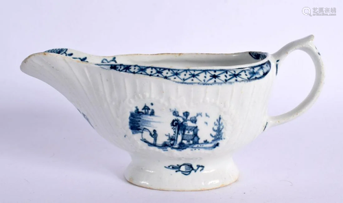 18TH CENTURY LOWESTOFT SAUCEBOAT PAINTED WITH A CHINESE LAND...