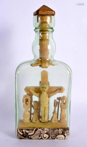 A RARE EARLY 20TH CENTURY CONTINENTAL FOLK ART CRUCIFIX BOTT...