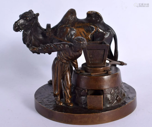 Russian School (19th Century) Bronze Male with a camel. 14 c...