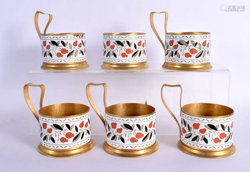 SIX VINTAGE RUSSIAN YELLOW METAL CUP HOLDERS decorated with ...