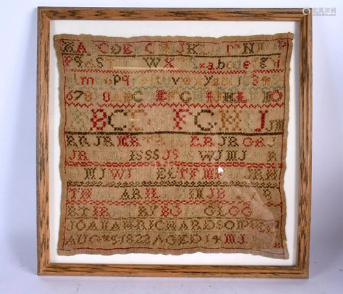 A FRAMED 19TH CENTURY EMBROIDERED SAMPLER. 33 cm square.