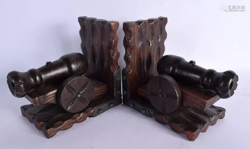 AN UNUSUAL PAIR OF MILITARY CANNON CARVED WOOD BOOK ENDS. 17...