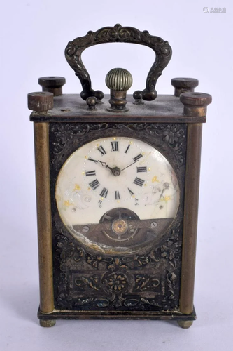 AN ANTIQUE MINIATURE CARRIAGE CLOCK. 11 cm x 6 cm inc handle...