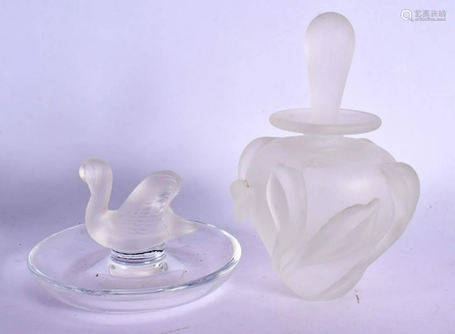 A FRENCH LALIQUE GLASS SWAN and a similar scent bottle. Larg...