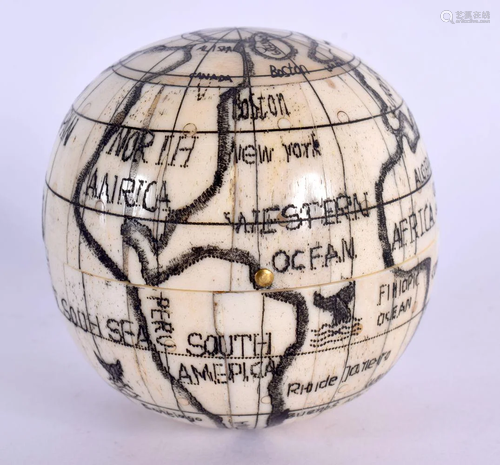 A CONTEMPORARY BONE GLOBE COMPASS. 7.5 cm wide.