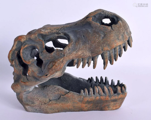 A CONTEMPORARY T REX DINOSAUR HEAD. 18 cm x 16 cm.