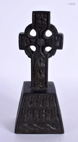 A RARE 19TH CENTURY IRISH CARVED BOG OAK CROSS SCULPTURE. 14...