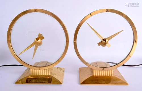 A RETRO PAIR OF 1970S PRESENTATION BRASS ATMOS TYPE CLOCKS. ...