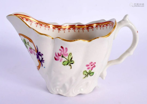 AN 18TH CENTURY ENGLISH PORCELAIN LOW CHELSEA EWER painted w...