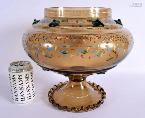 A LARGE ANTIQUE ENAMELLED GLASS BOWL embellished with flower...