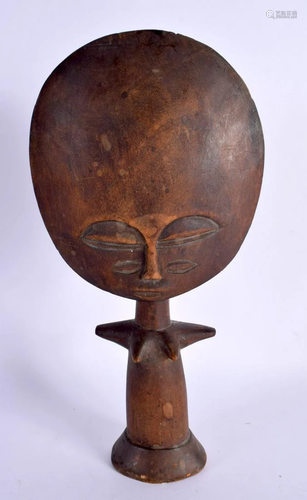 AN AFRICAN TRIBAL CARVED WOOD MOON HEAD FERTILITY DOLL. 27 c...