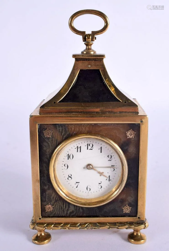 AN EDWARDIAN SILVER GILT AND TORTOISESHELL MINIATURE CLOCK w...