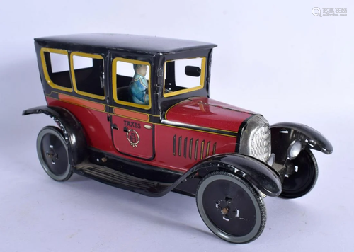 A VINTAGE TIN PLATE TOY CAR. 20 cm x 12 cm.