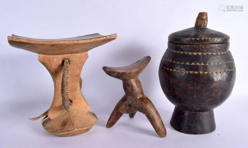 TWO AFRICAN TRIBAL CARVED WOOD HEAD RESTS together with a ja...