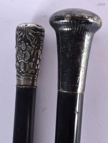 TWO ANTIQUE SILVER MOUNTED WALKING CANES. 90 cm long. (2)