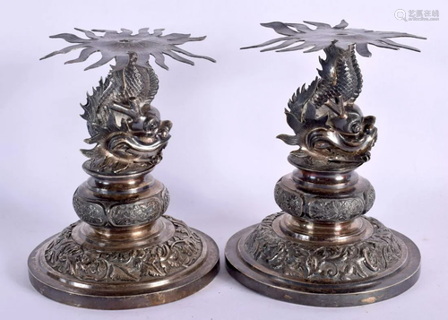 A PAIR OF 19TH CENTURY CHINESE EXPORT SILVER PEDESTAL STANDS...