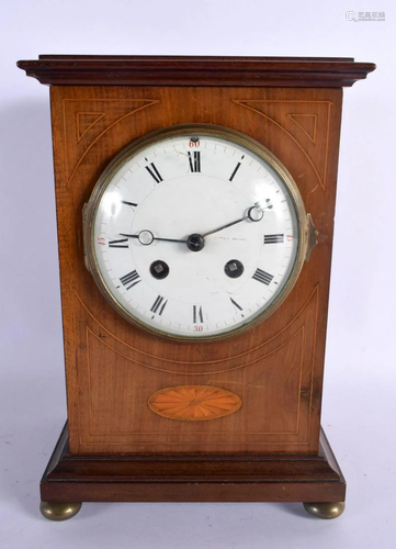 AN EDWARDIAN MAHOGANY MANTEL CLOCK. 24 cm x 15 cm.