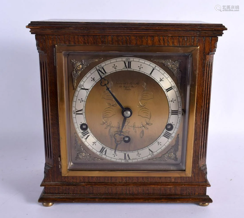 A GARRARD & CO LONDON OAK MANTEL CLOCK. 24 cm x 21 cm.