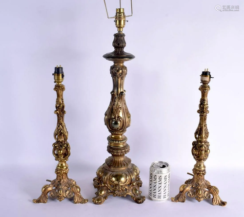 THREE EUROPEAN GILT METAL CANDLESTICKS converted to lamps sm...