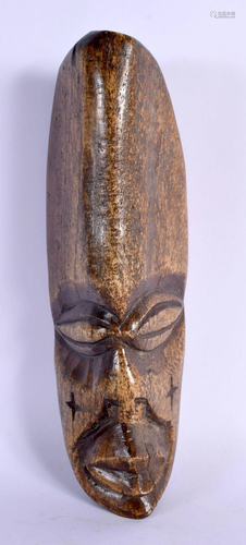 A 19TH CENTURY AFRICAN TRIBAL CARVED BONE LEGA MASK with cro...