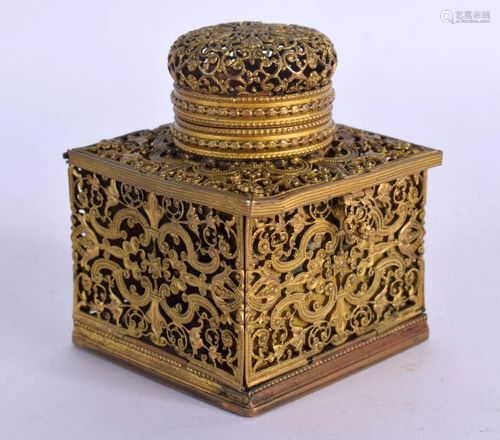 A 19TH CENTURY EUROPEAN GILT METAL INKWELL decorated with fo...