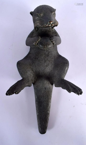 AN UNUSUAL EUROPEAN BRONZE FIGURE OF AN OTTER No 4 of 30 mod...