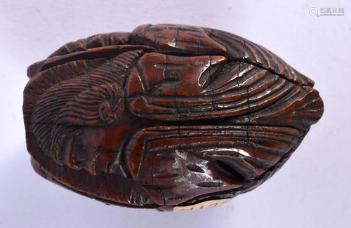 A FINE AND RARE 18TH CENTURY EUROPEAN CARVED COQUILLA NUT BO...