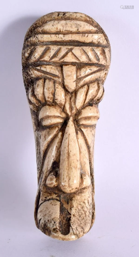 A RARE 19TH CENTURY AFRICAN CARVED BONE TRIBAL MASK HEAD for...