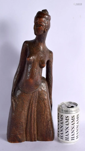 A 1930S ART DECO CARVED WOOD FIGURE OF A NUDE FEMALE. 40 cm ...