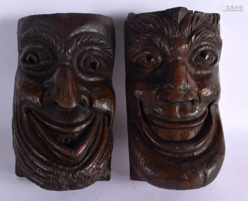 A PAIR OF 18TH CENTURY CARVED WOOD THEATRICAL TREEN MASK HEA...