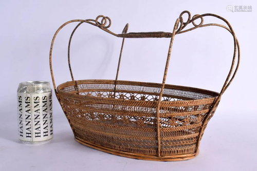 A REGENCY WICKET BASKET decorated with foliage and vines. 28...