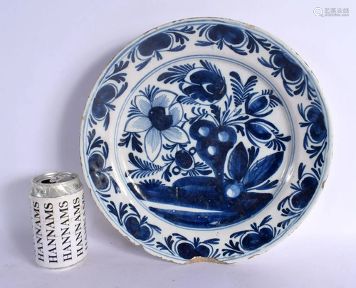 A LARGE 18TH CENTURY DELFT BLUE AND WHITE DISH painted with ...