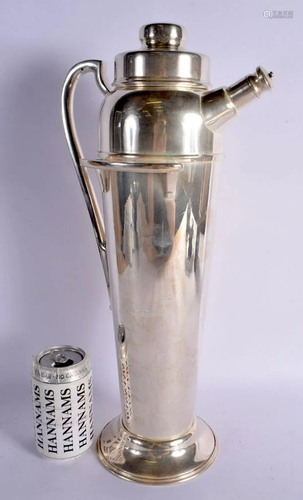 A LARGE SILVER PLATED COCKTAIL SHAKER. 45 cm x 18 cm.