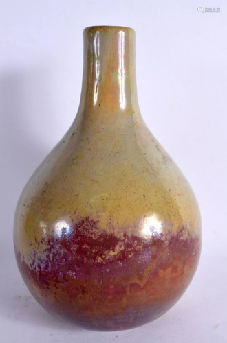 AN UNUSUAL EARLY 20TH CENTURY PURPLE SPLASH VASE modelled in...