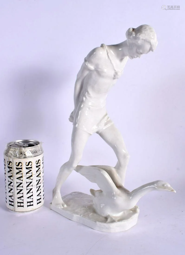 A ROSENTHAL HAUENSTEIN PORCELAIN FIGURE. 31 cm x 15 cm.