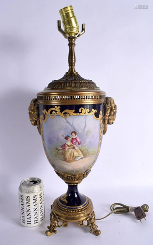 A LARGE 19TH CENTURY FRENCH SEVRES PORCELAIN LAMP painted wi...