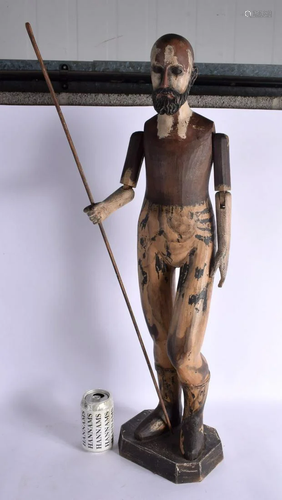 A LARGE CONTINENTAL CARVED WOOD FIGURE OF AN ARTICULATED MAL...