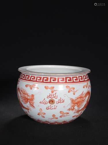CHINESE IRON-RED CROCK DEPICTING 'DRAGON PURSUING PEARL...