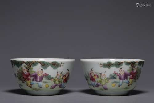 TWO CHINESE FAMILLE-ROSE CUPS DEPICTING 'CHILDREN AT PL...