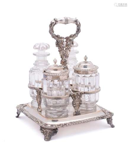 An electro-plated four division cruet stand: of square outli...