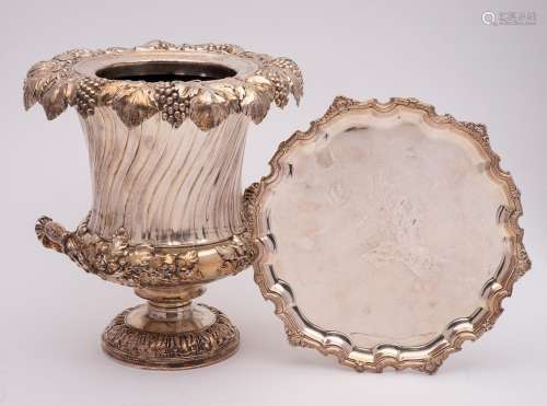 A silver plated ice pail of campagna form: with grape and vi...