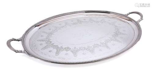 A plated oval serving tray: inscribed, with beaded border an...